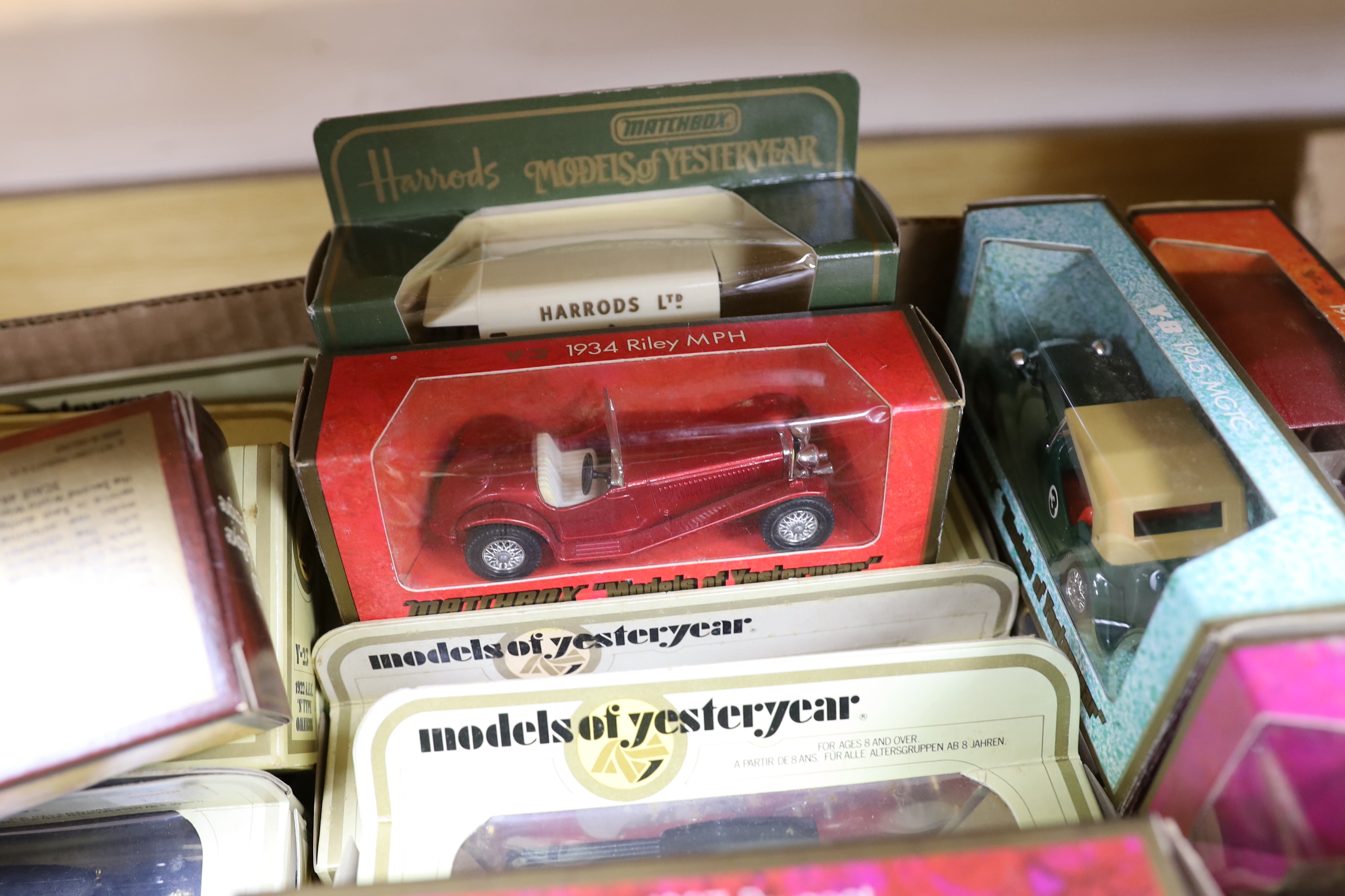 A collection of boxed Matchbox Models of Yesteryear (94 vehicles) in a variety of era boxes, mostly cream window boxes, some ‘wood effect’ boxes, etc.